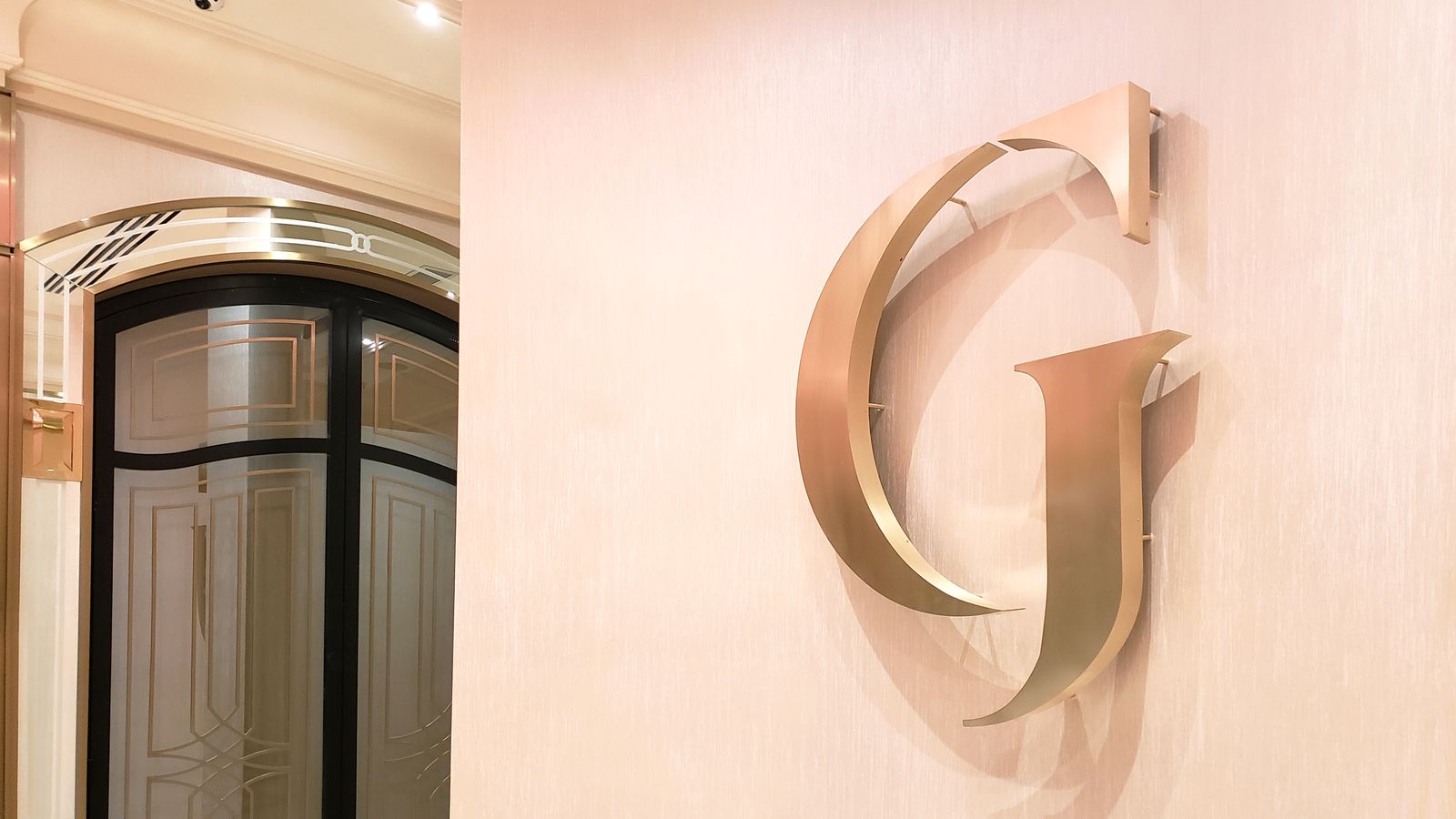 Grand Venue 3d logo sign with the letter G made of aluminum for interior branding