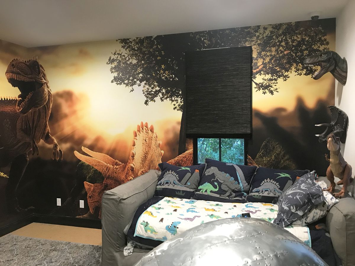 custom interior wall sign with big prints of dinosaurs made of opaque vinyl for decorating