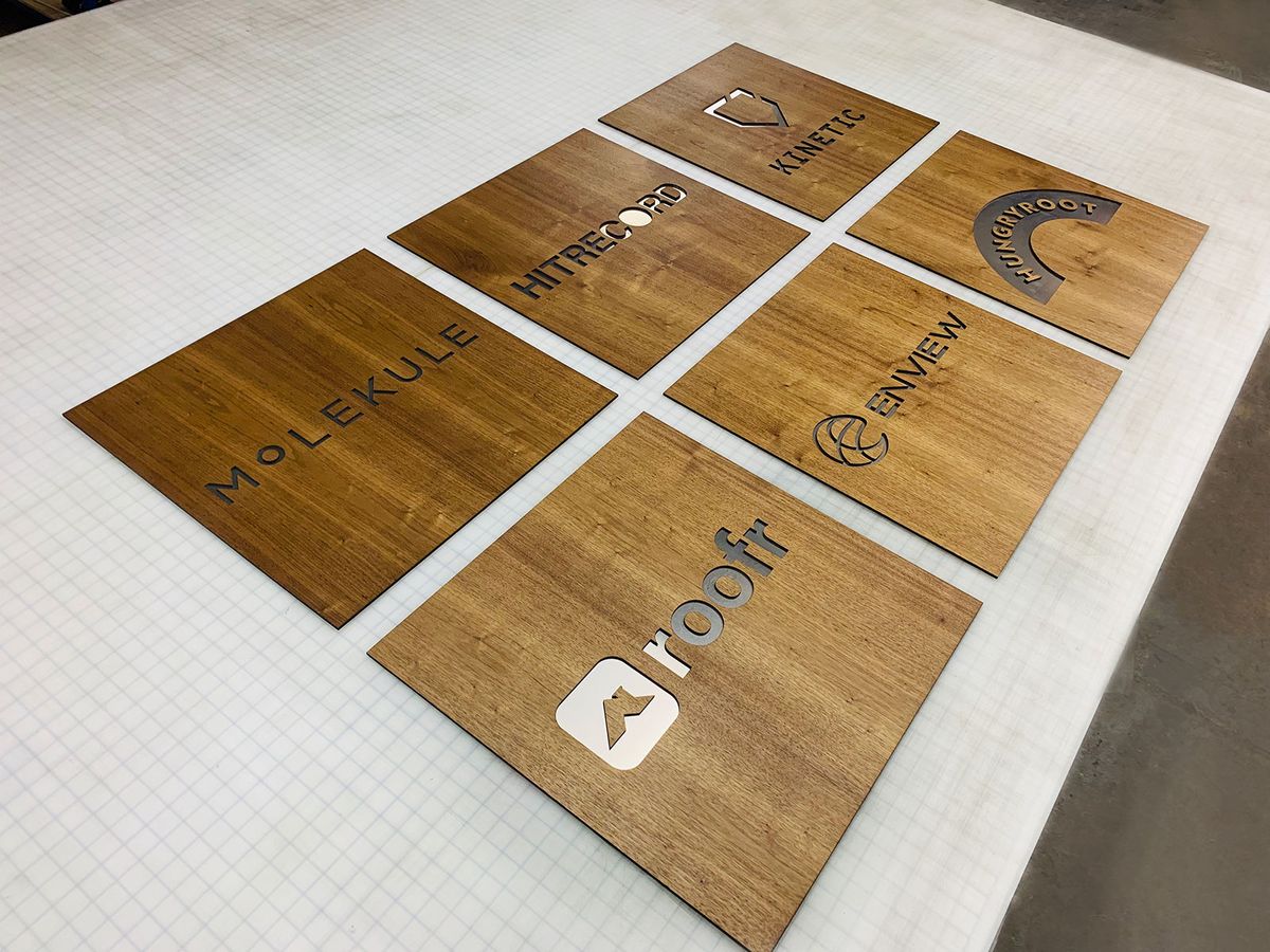 Multiple wooden nameplates