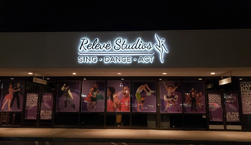 Relieve Studios backlit business logo-Frontsigns