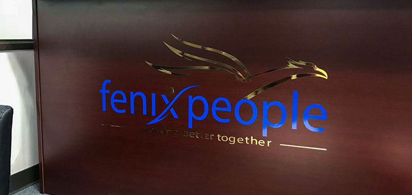 Example from Fenix People's lobby design showing how to design a sign made of vinyl