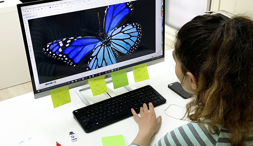 graphic designer working on design-Frontsigns