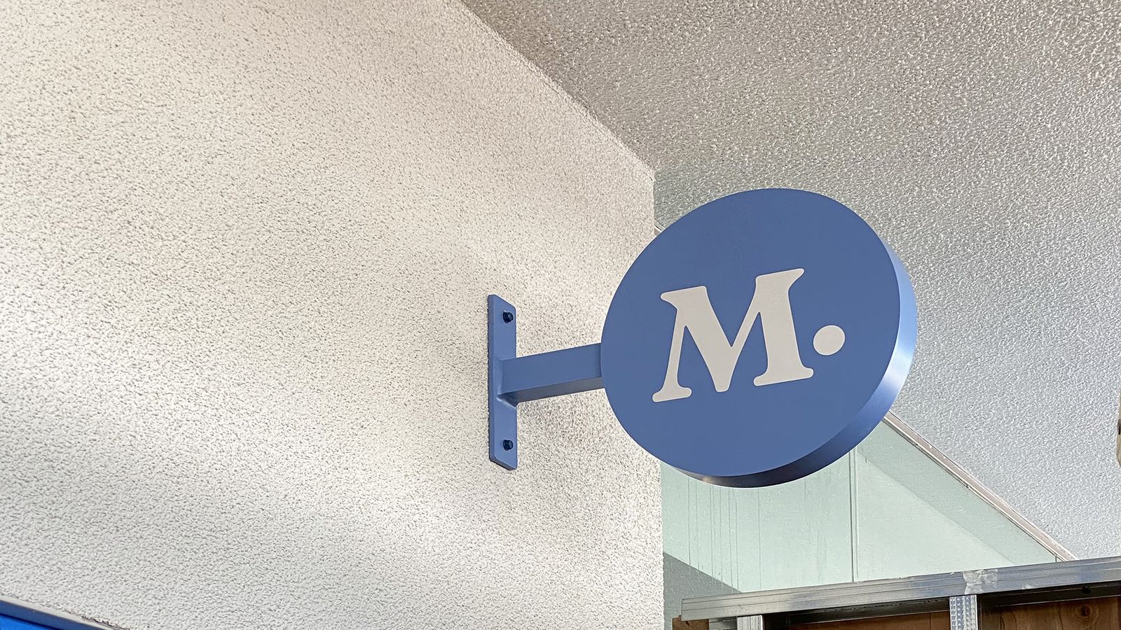 Modern Animal light box logo sign in blue made of aluminum and acrylic for interior branding