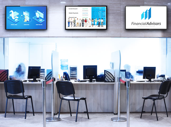 Financial Advisors bank interior with screens