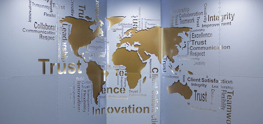 World map wall decorative solution as a design idea for bank office