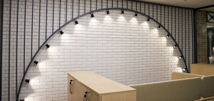 Arch shaped lighting design idea for office space