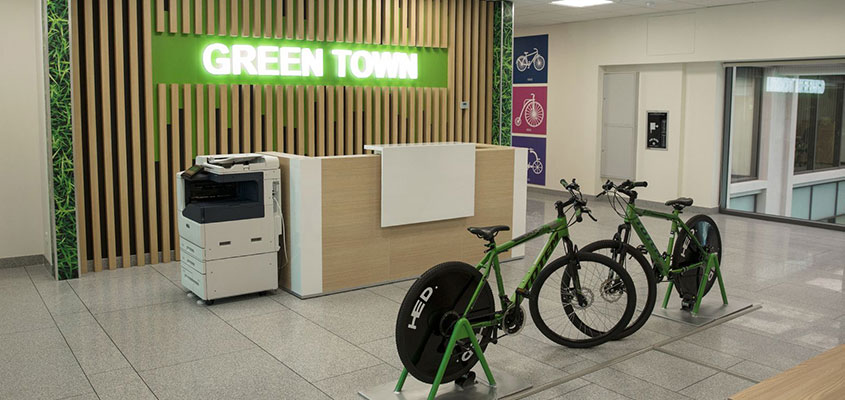 Office entry design idea with a bicycle parking for highlighting the company uniqueness