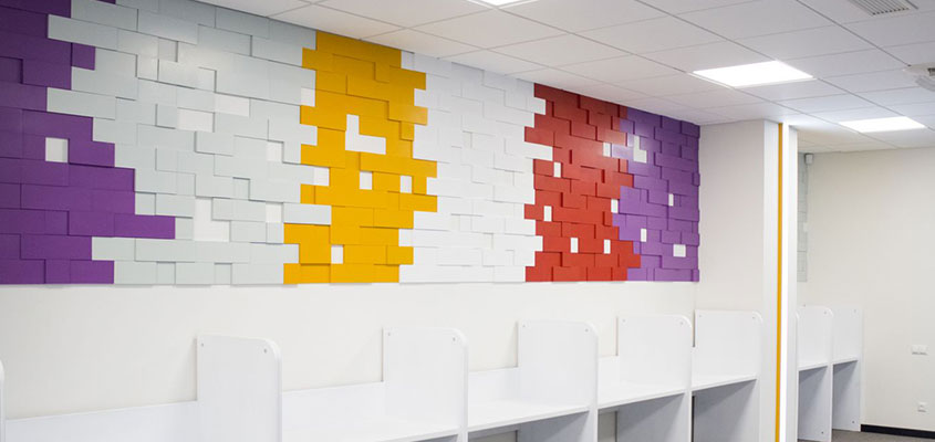 Puzzle shaped office wall design for hang out corner 