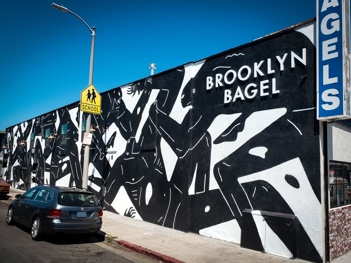 Brooklyn Bagel 3d sign painted in white displaying the company name made of aluminum