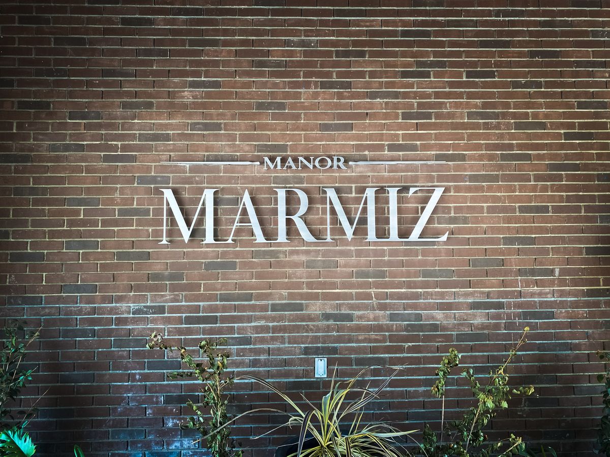 Manor Marmiz 3d sign letters displaying the company name made of brushed aluminum