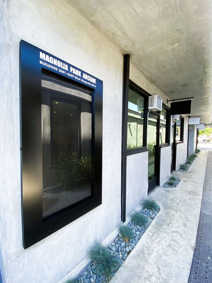 Wall-mounted building sign