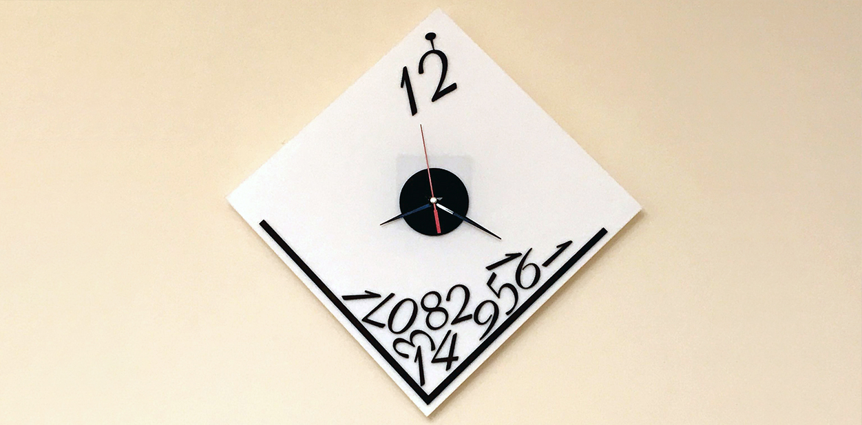 Decorative wall clock creative laser cut idea displayed on the wall