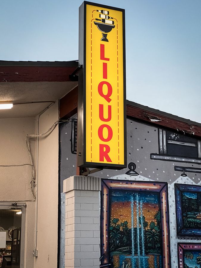 The Liquor Fountain light box sign made of aluminum and acrylic for storefront branding