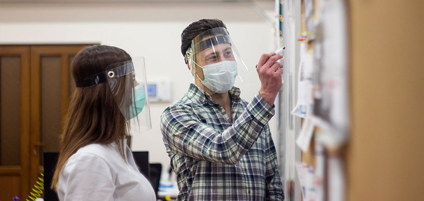 Protective face shield for workspace to safeguard the entire face