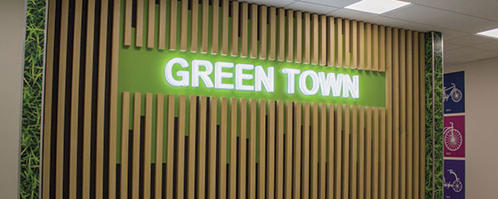 Green Town restaurant interior design idea with wooden and live elements