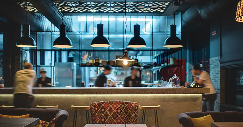 Unique restaurant kitchen design idea in blue tint