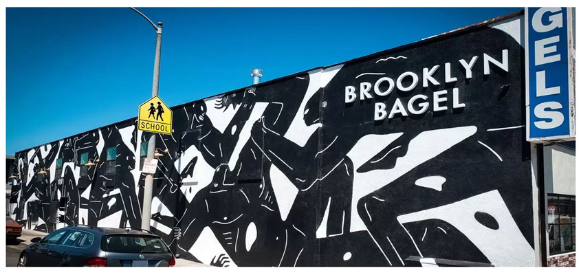 Brooklyn Bagel cool exterior design with black and white human wall mural