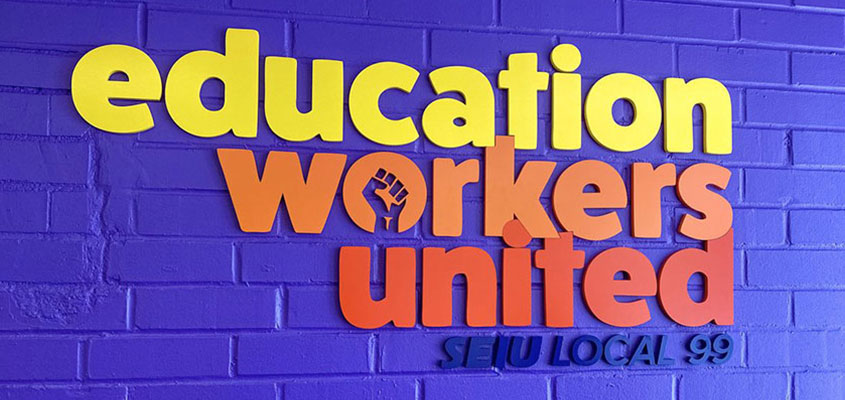 Colorful sign design elements from Education Workers United sign example