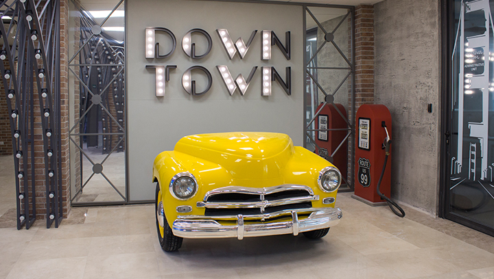 Down Town marquee letters in a wall-mounted retro style made of aluminum for branding