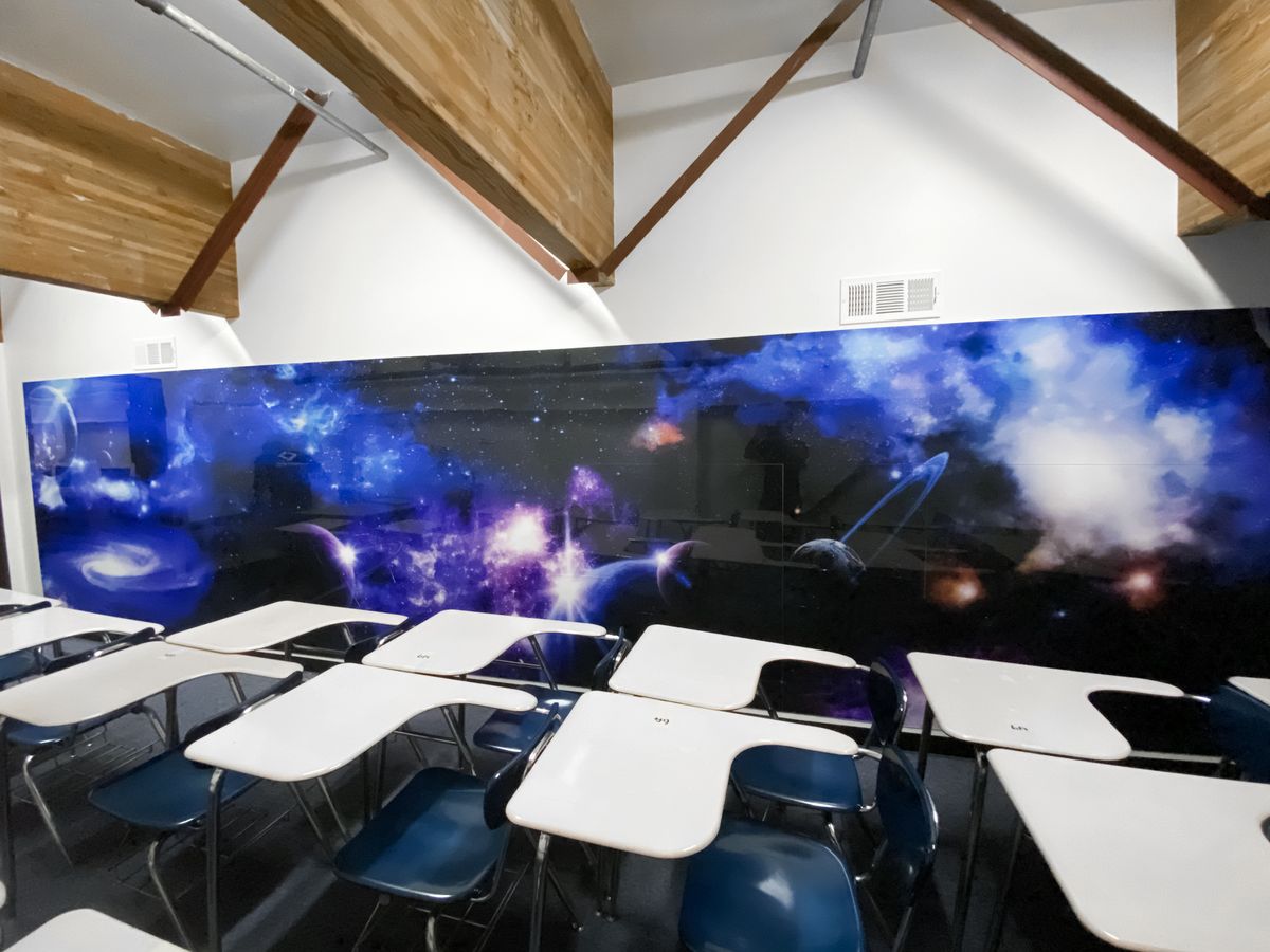 decorative interior wall sign with galaxy-themed graphics made of acrylic for classroom design