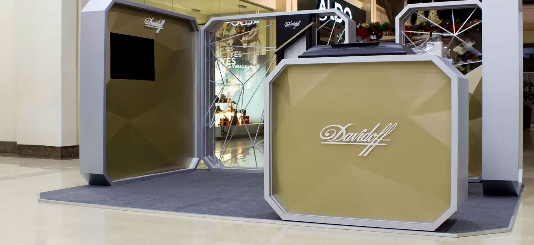 Davidoff trade show sign with white brand name letters made of wood, acrylic, and aluminum