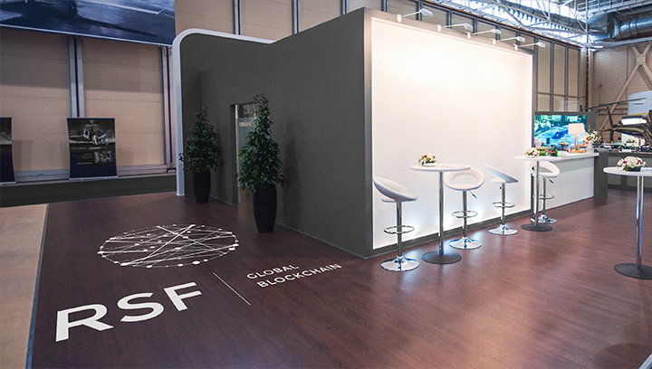 RSF trade show floor graphics in white displaying the brand name and logo
