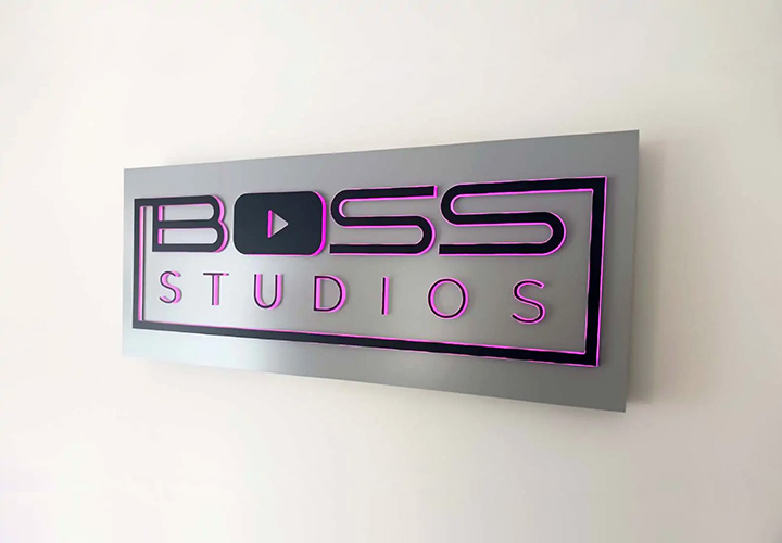 Boss Studios halo-lit sign in a custom style made of aluminum and acrylic for interior branding