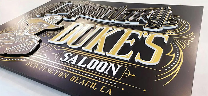 Dukes Saloon halo-lit signs in a retro style made of aluminum and acrylic for branding