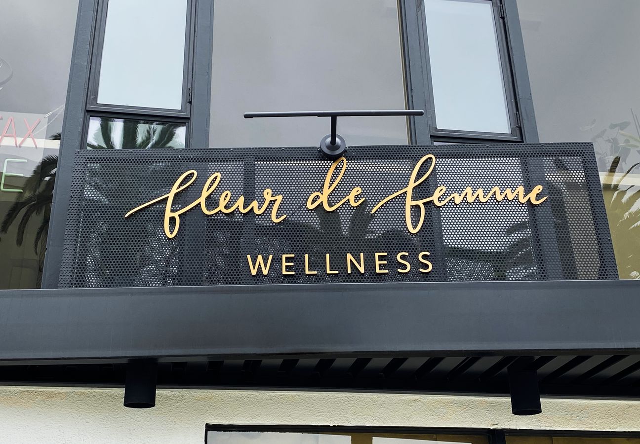 Fleur De Femme Wellness 3d plastic letters sign painted in gold color made of PVC