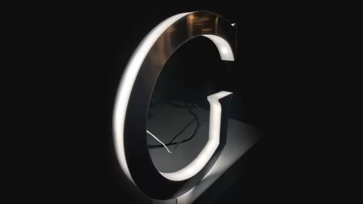 Halo-lit sign for side lit stand alone display in the shape of a letter made of aluminum