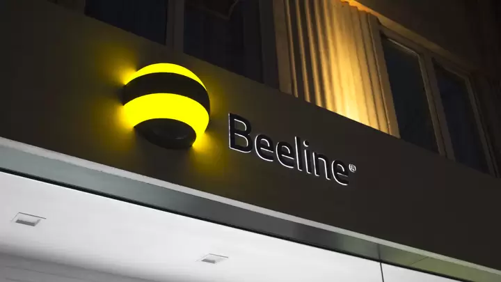 Halo-lit signs for storefront with brand name and logo made of aluminum and acrylic