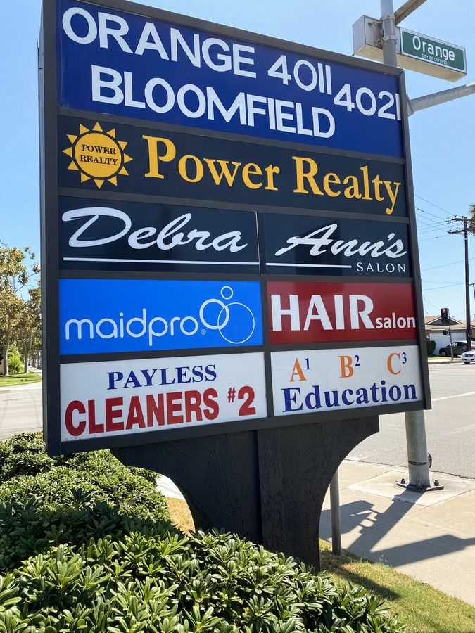 Maidpro pylon light box sign displaying the company name and logo made of aluminum and acrylic