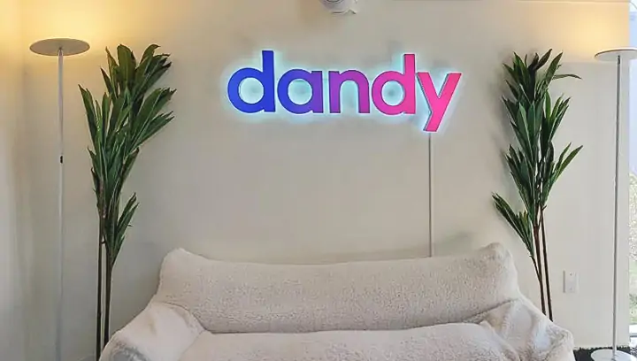 Reverse channel letters for Dandy, hung indoors, blue to pink gradient