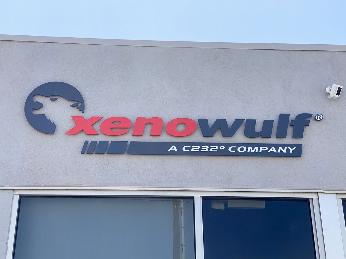 XenoWulf custom 3d sign displaying the company name and logo made of aluminum