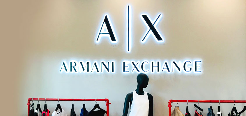 Branded signage design idea from Armani's interior design