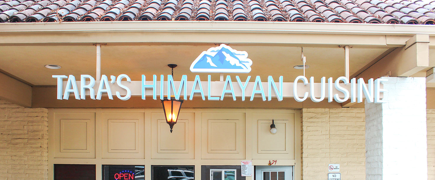 Tara's Himalayan Cuisine restaurant sign showcasing the brand name made of acrylic and aluminum
