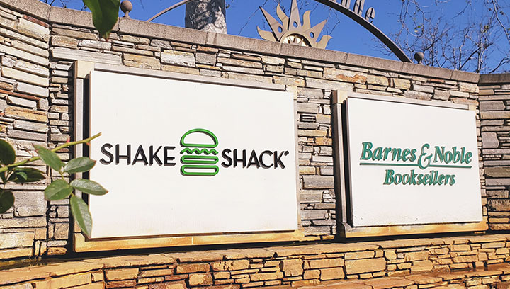 Shake Shack restaurant sign displaying the brand name and logo made of acrylic for branding