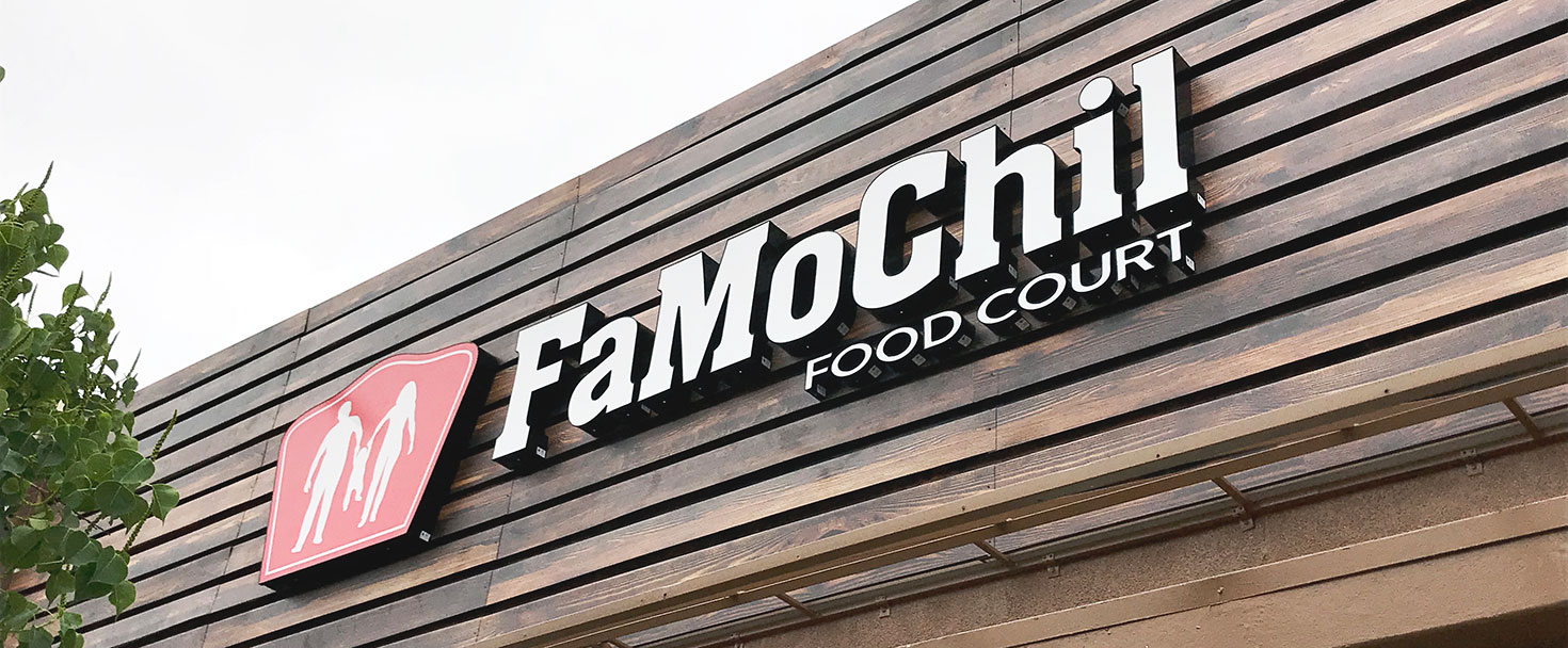 Famochil restaurant sign in white and red made of acrylic and aluminum for facade branding