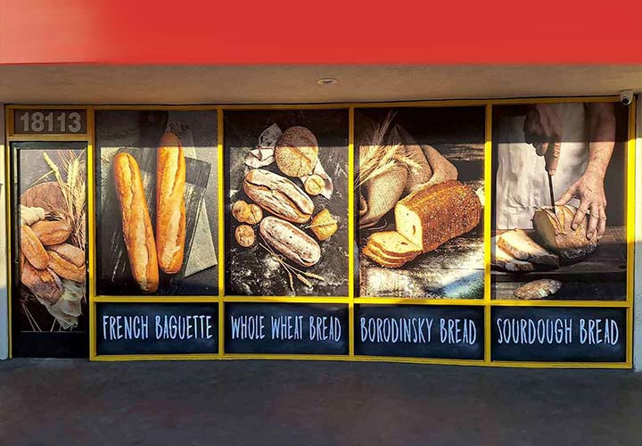 Mom's Lavash store signs with the product offers made of opaque vinyl for full window branding