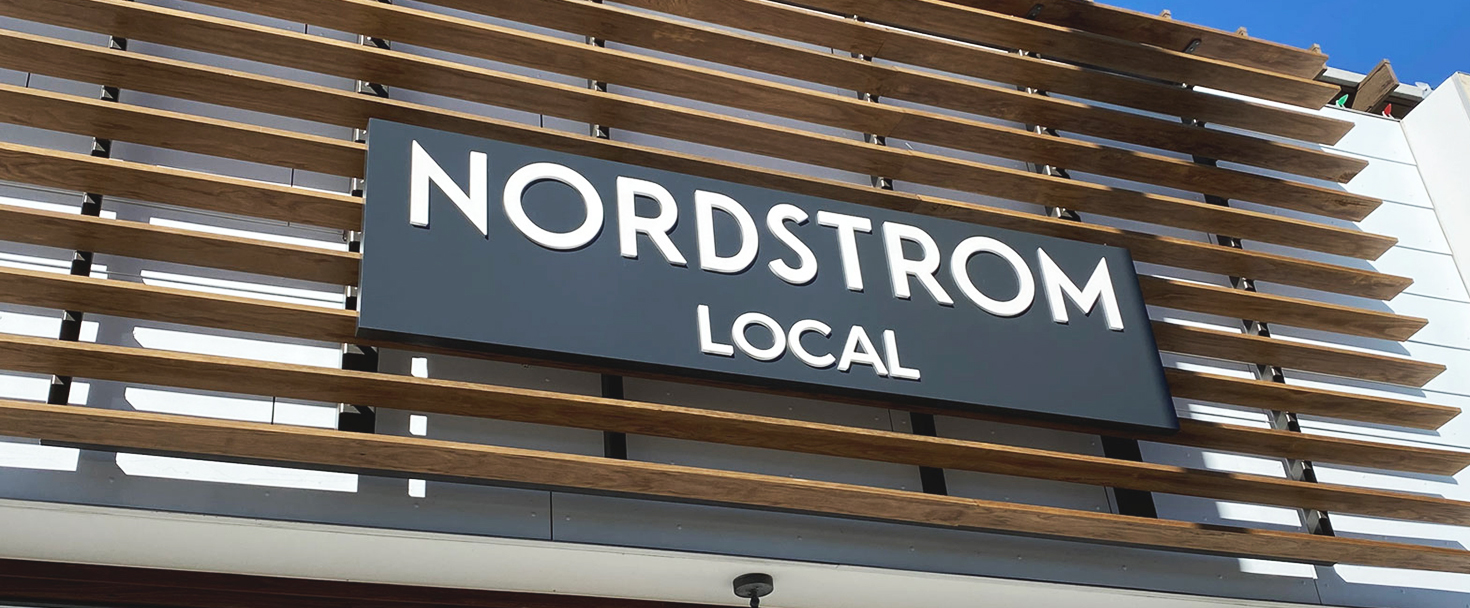 Nordstrom Local storefront sign with push through letters made of aluminum and acrylic