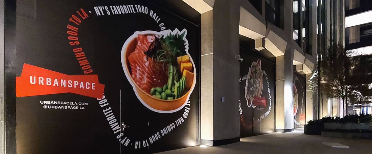 Urbanspace restaurant sign with promotional displays made of opaque vinyl for window branding