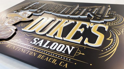Duke's saloon push through sign