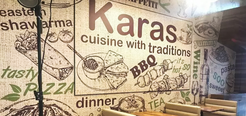 Corporate branding idea displayed on the wall from Karas restaurant