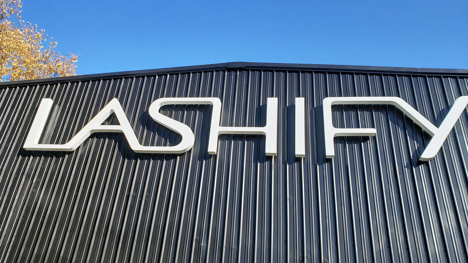 Lashify illuminated 3d sign in big size with the brand name made of acrylic and aluminum