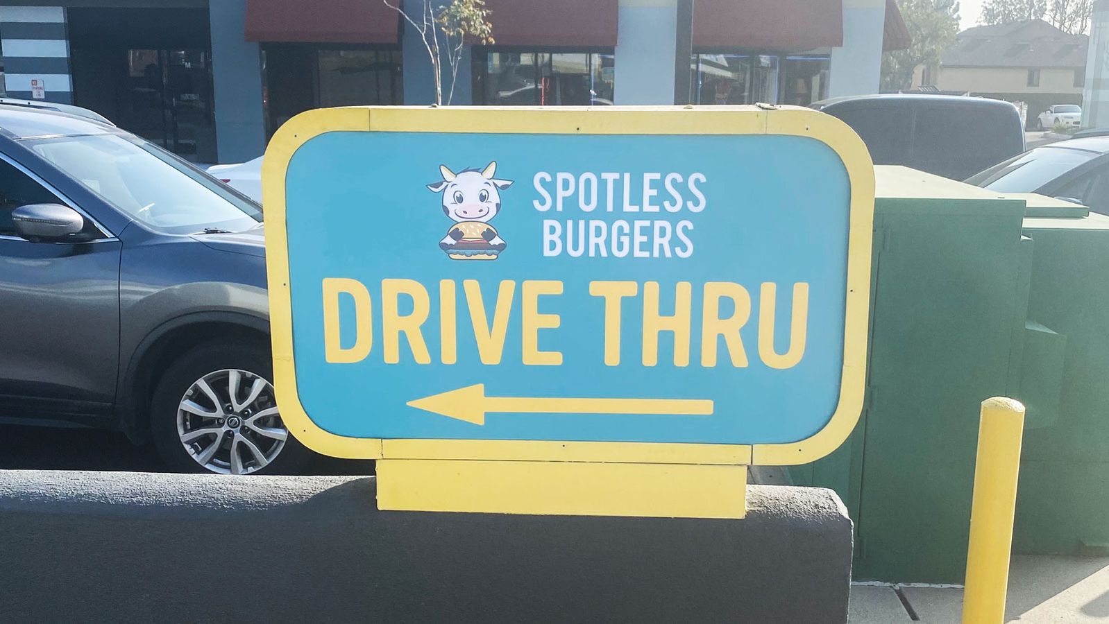 Spotless burgers acrylic sign