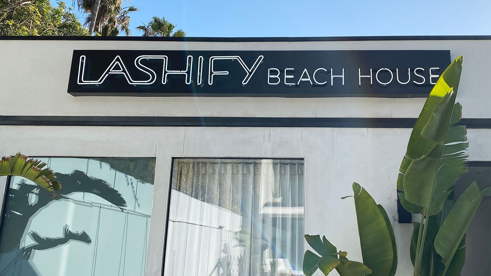 Lashify storefront neon sign