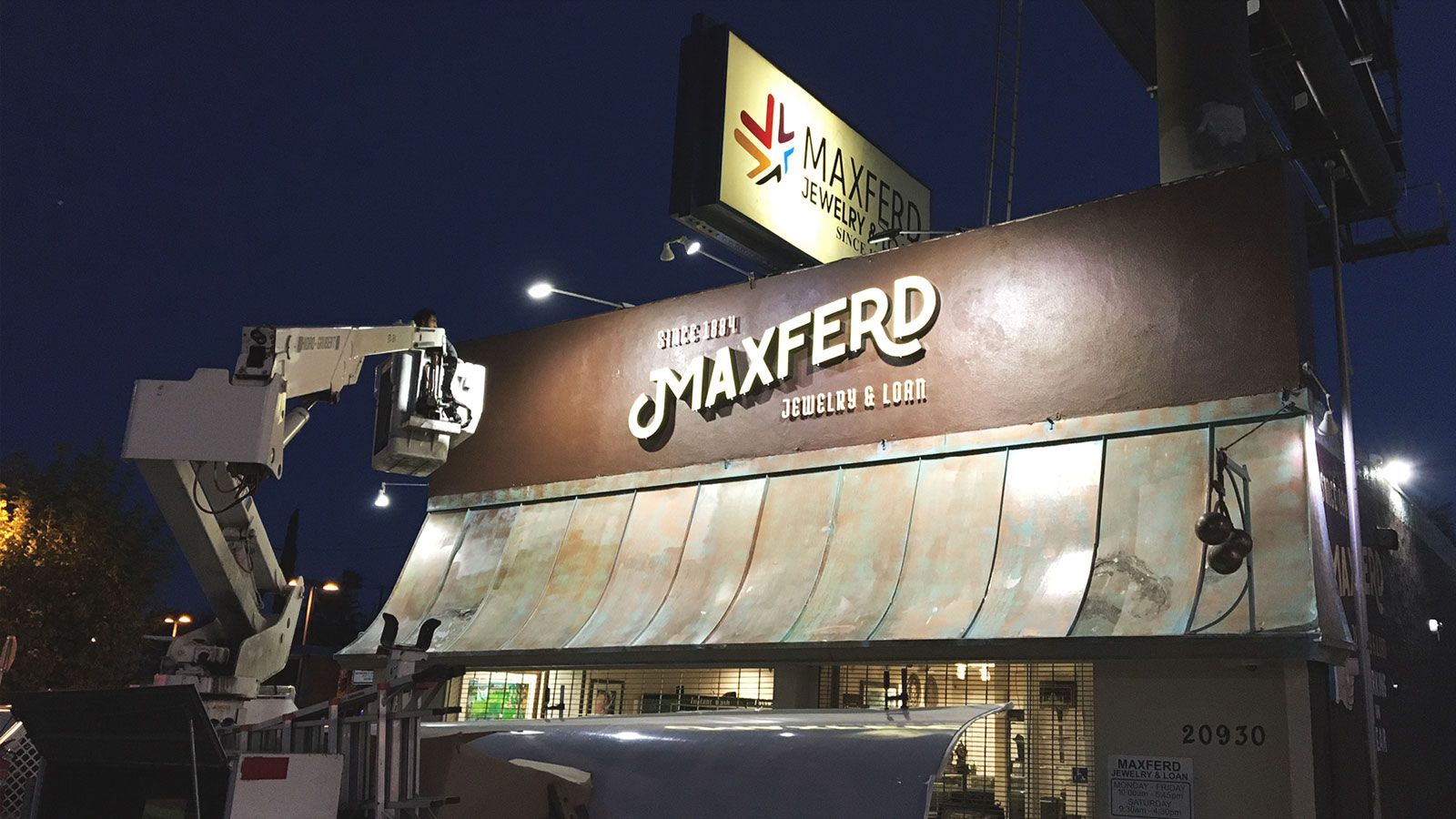 Maxferd storefront sign installation