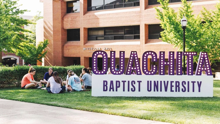 Ouachita Baptist school monument sign in purple and white made of aluminum and acrylic