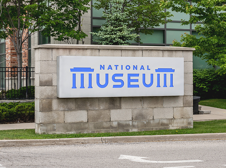 National Museum building monument sign displaying the museum name outdoors