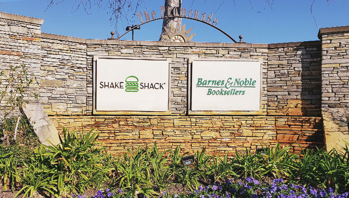 Shake Shack architectural monument sign displaying the company name and logo made of acrylic